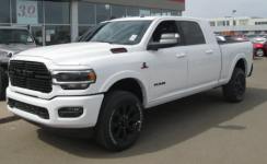 2020 Ram 3500 Mega Cab Night Edition Front Quarter.png